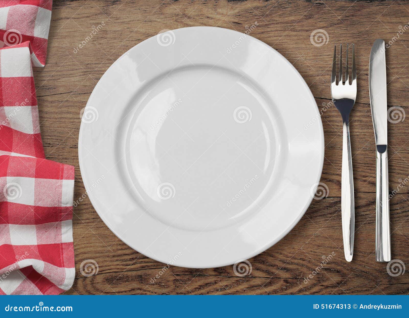 dinner table with dinning plate, fork and knife