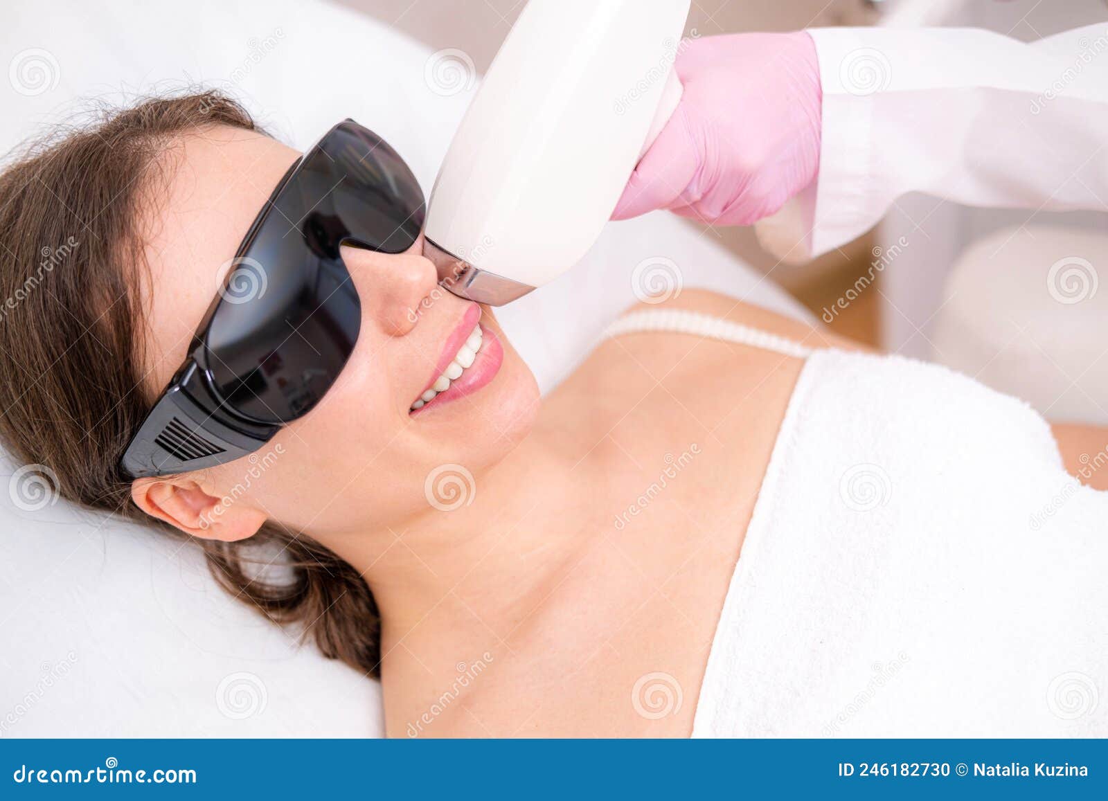 diode laser hair removal, beautician removes hair on beautiful female face, hair removal for smooth skin, laser