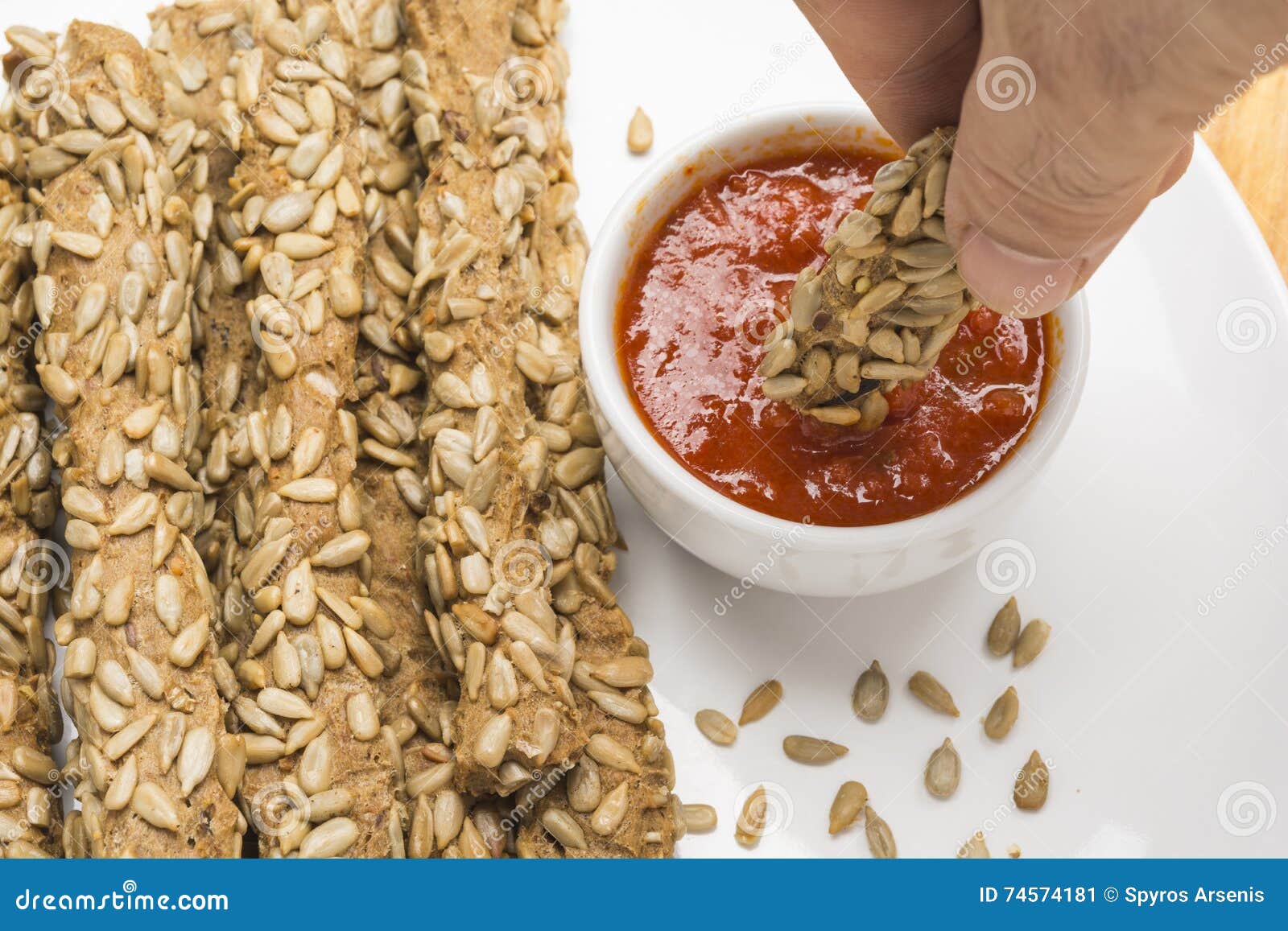 Dipping a Breadstick in Sauce Stock Image Image of organic, close