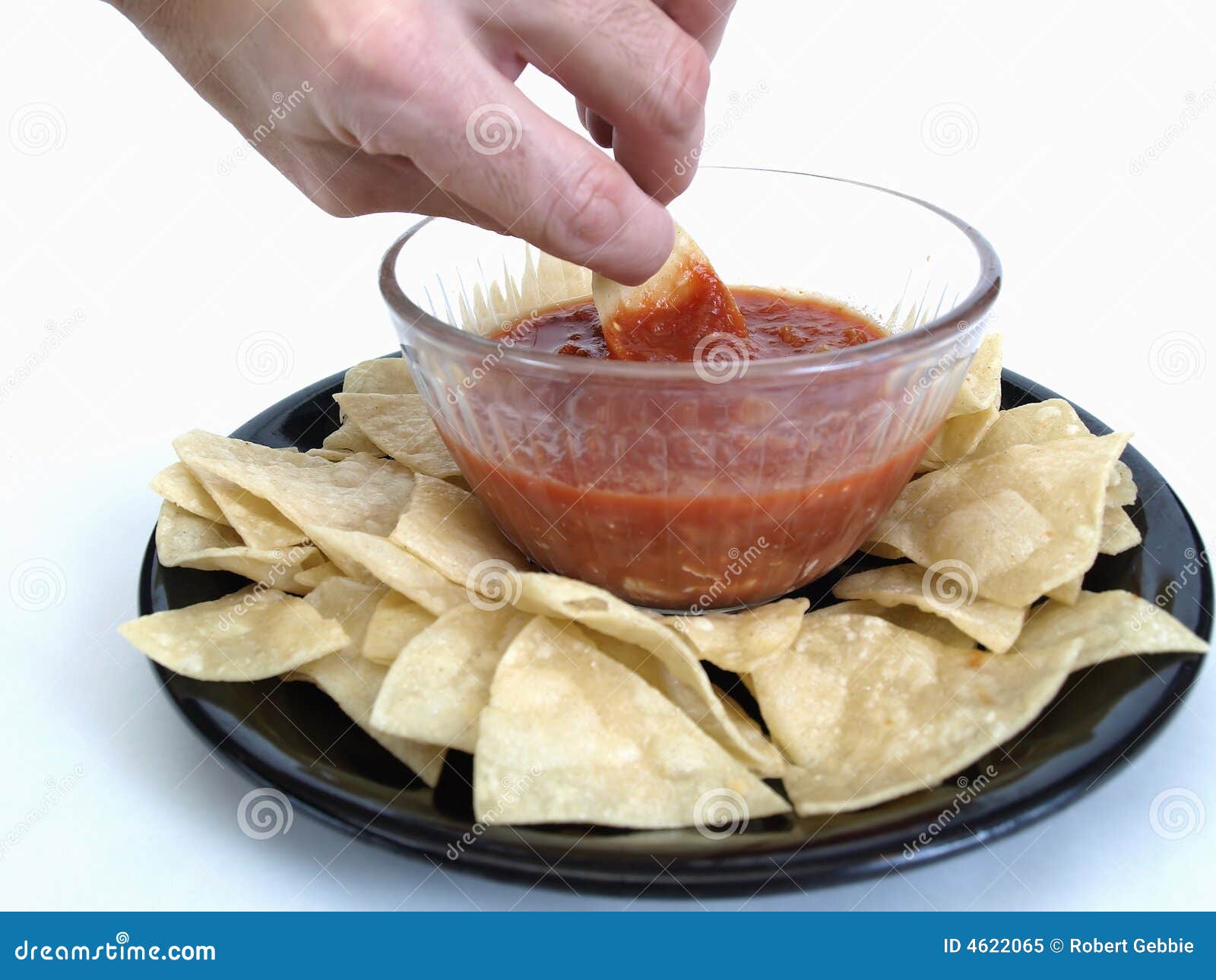 Dipping a Chip stock image. Image of glass, male, black 4622065