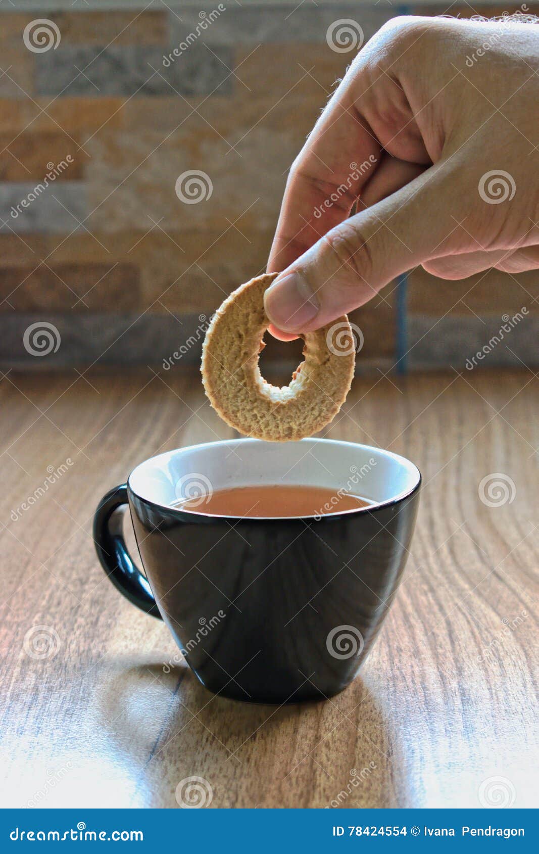 Dipping a Cookie stock photo. Image of table, caucasian 78424554