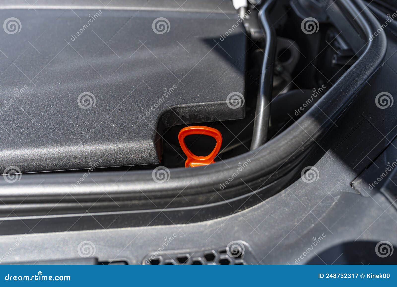 Dipstick for Checking the Oil Level in a Car Engine in Orange. Stock Image Image of automotive
