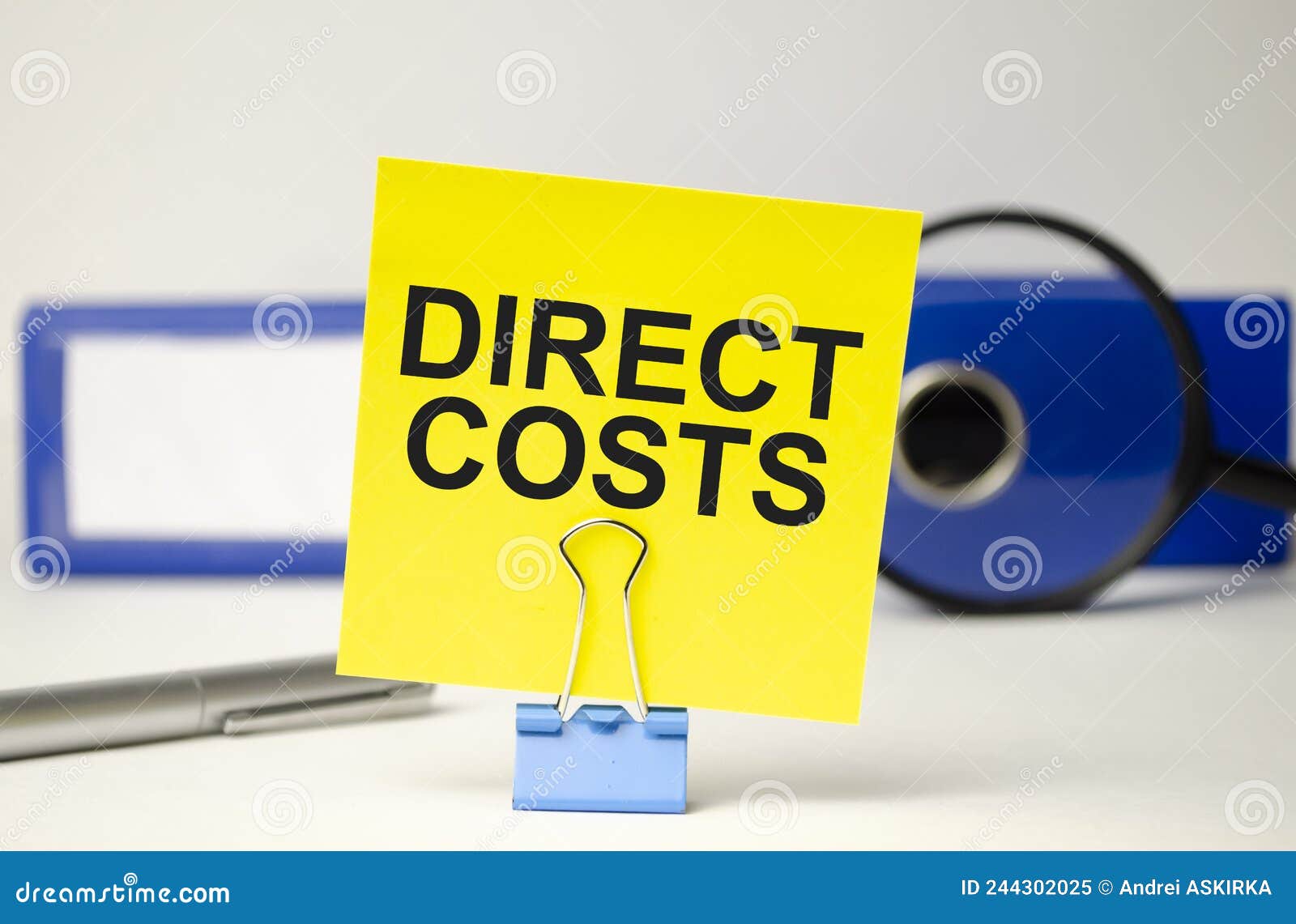 DIRECT COSTS Business Concept, Message on Sticker on Folder