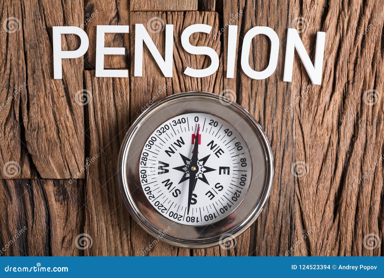 Compass with Pension Text on Wood Stock Photo Image of equipment