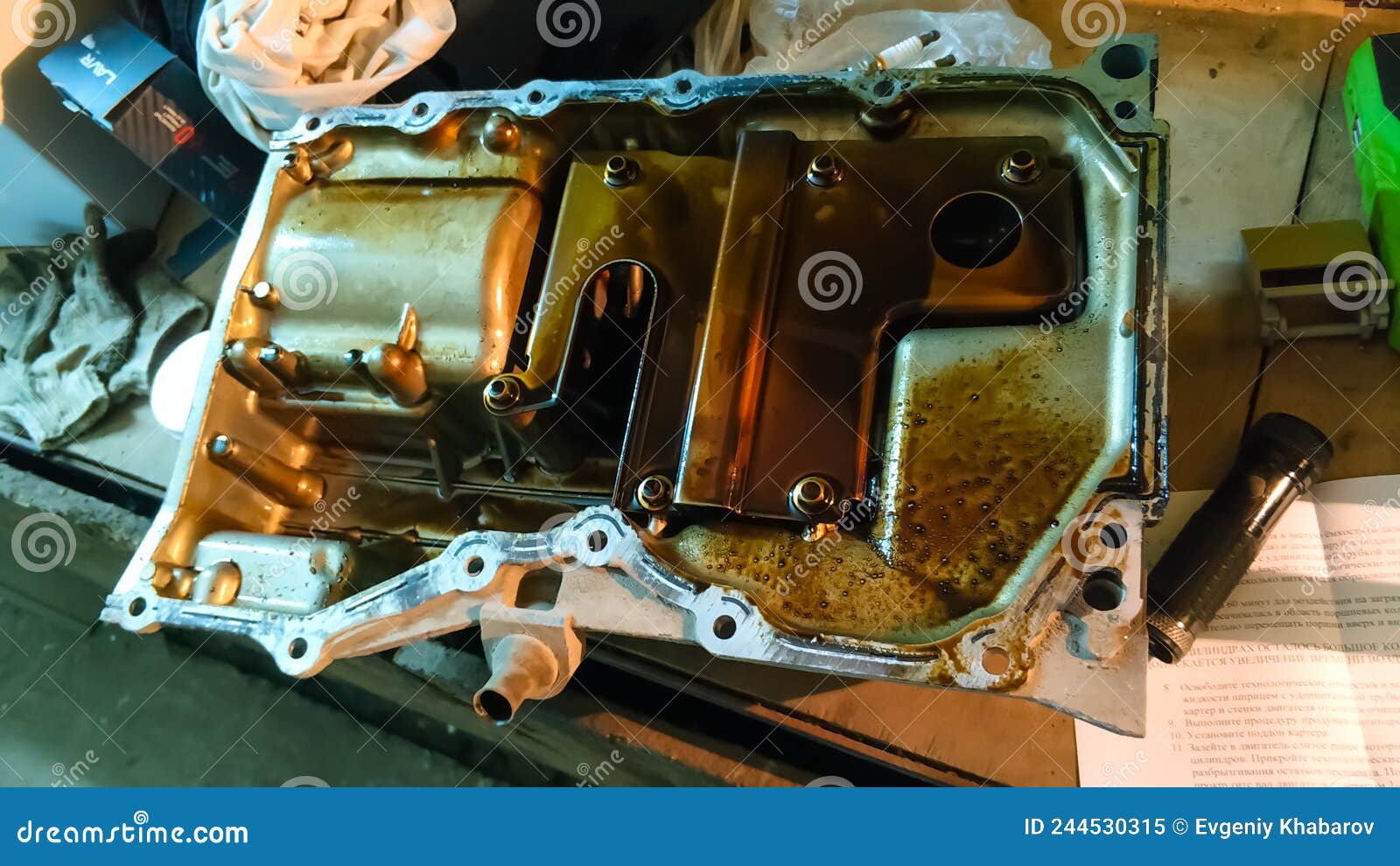 Dirty car engine sump. stock image. Image of factory 244530315