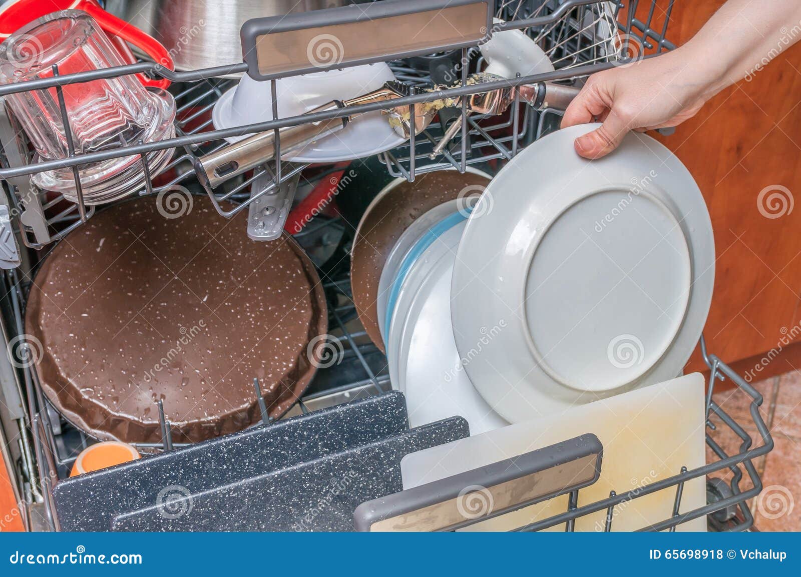 Dirty Dishes in Dishwasher and Female Hand Stock Photo Image of