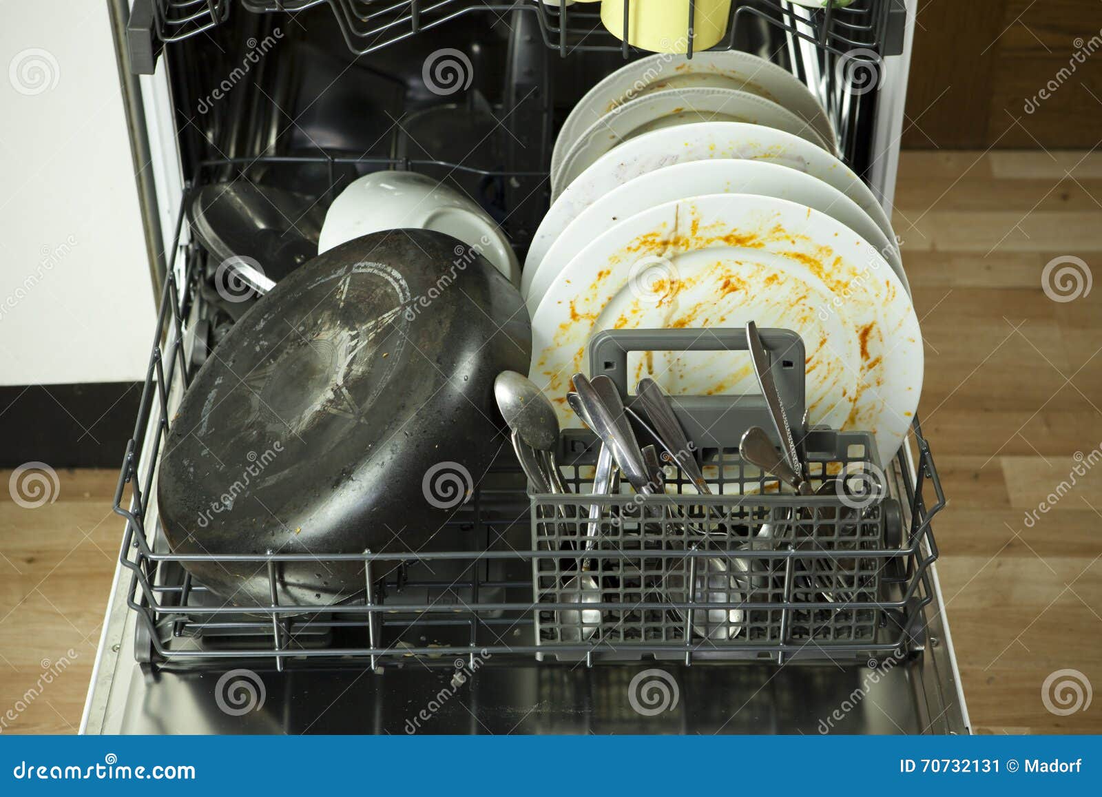 dirty dishware in dishwasher