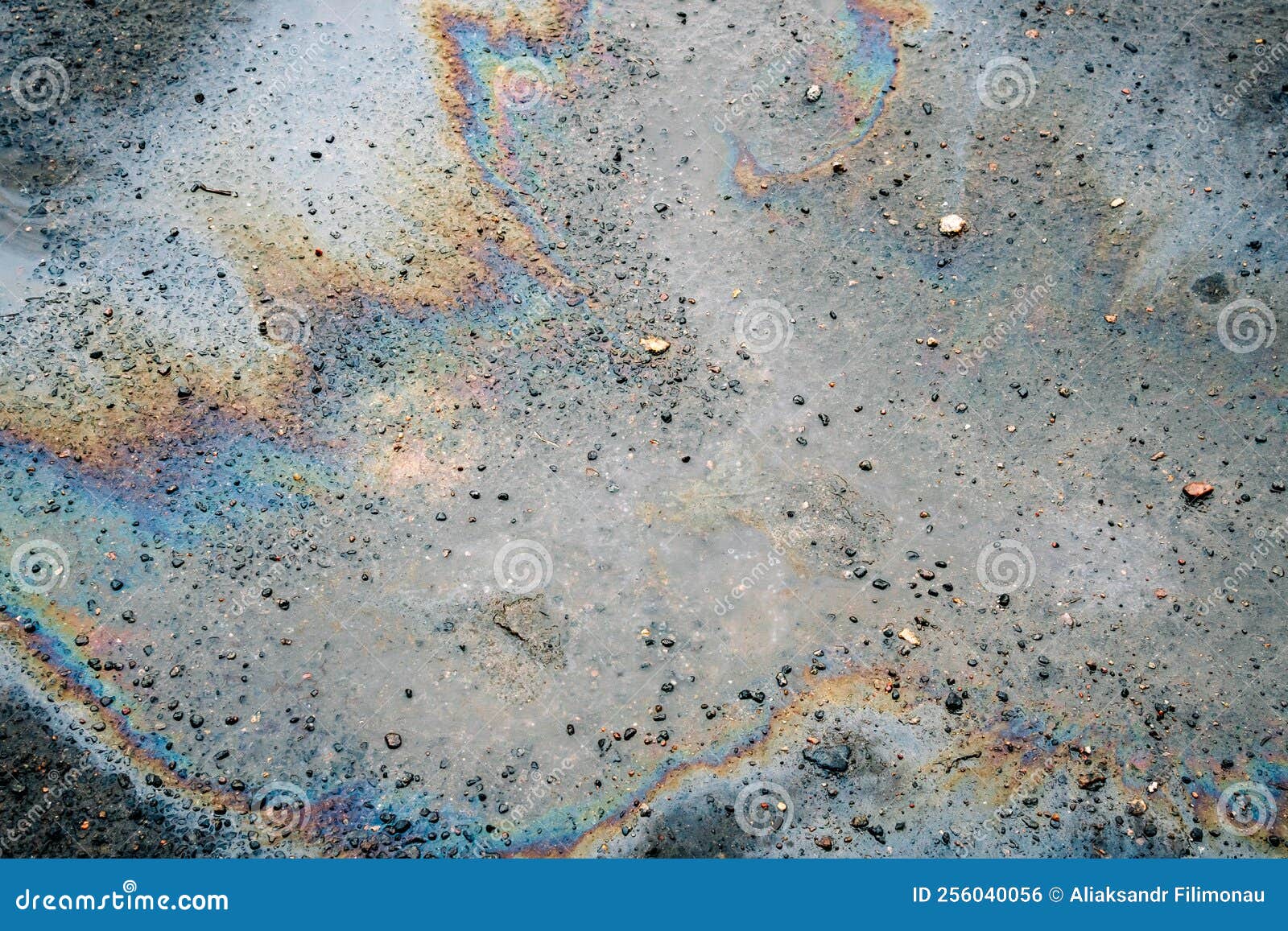 Dirty Multi Colored Stain From Engine Oil On Asphalt Stock Photo