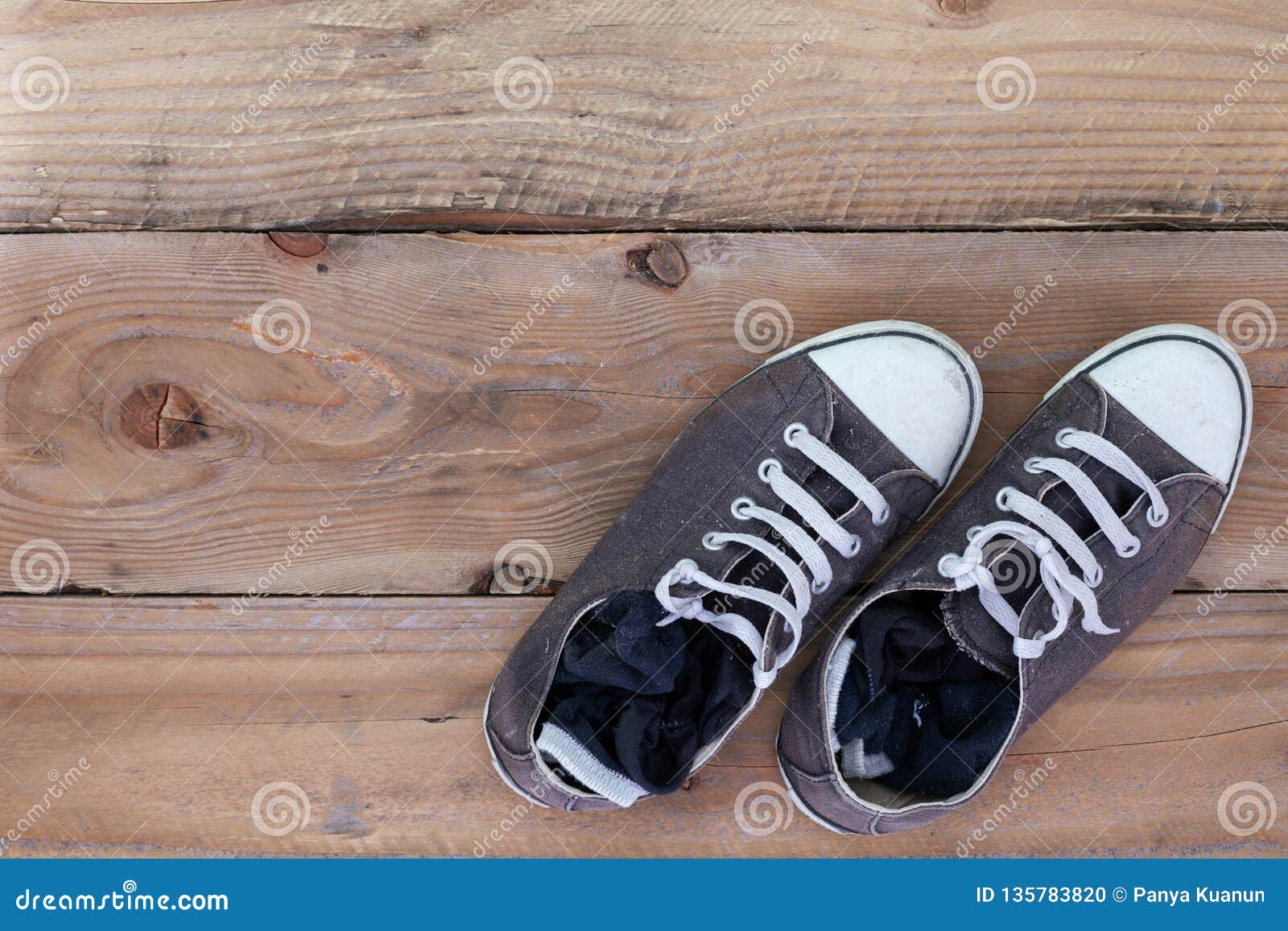 Dirty Old Shoes on Wooden Floor, with Copy Space. Top View Stock Photo ...