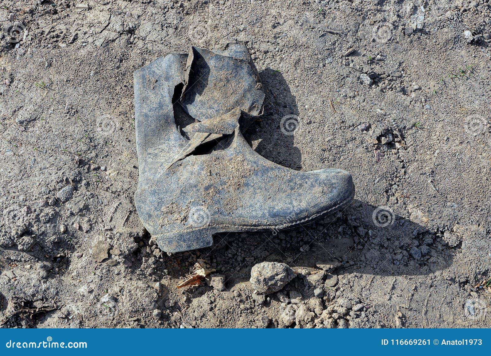 Dirty Ragged Rubber Boot on the Ground Stock Image - Image of rough ...