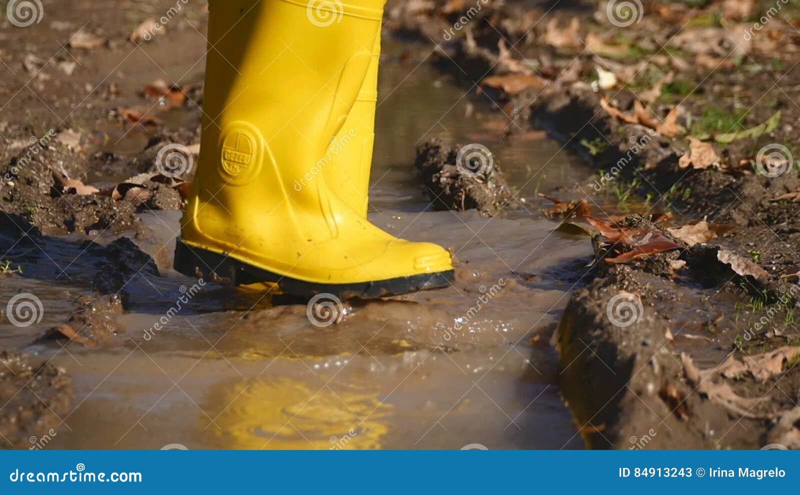 Dirty Rubber Boot Steps into Dirty Water in Slow Motion Stock Video