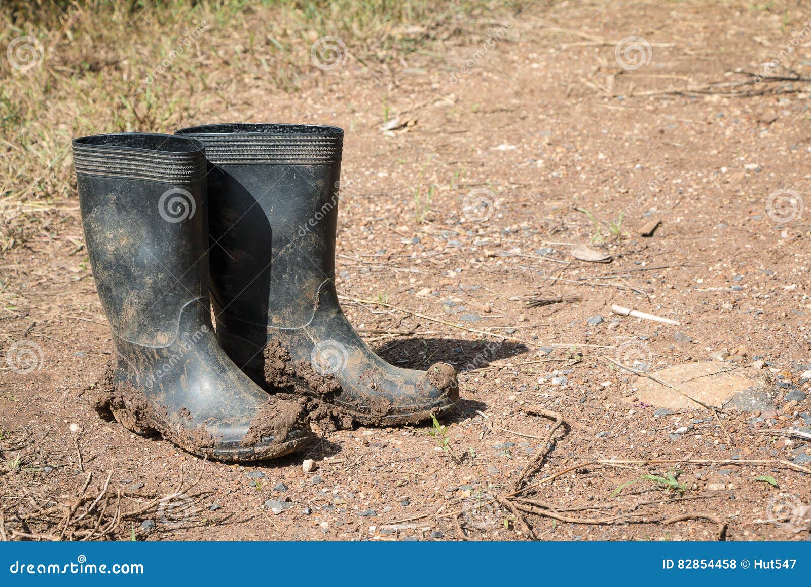 Dirty rubber boots stock photo. Image of plastic, grimy - 82854458