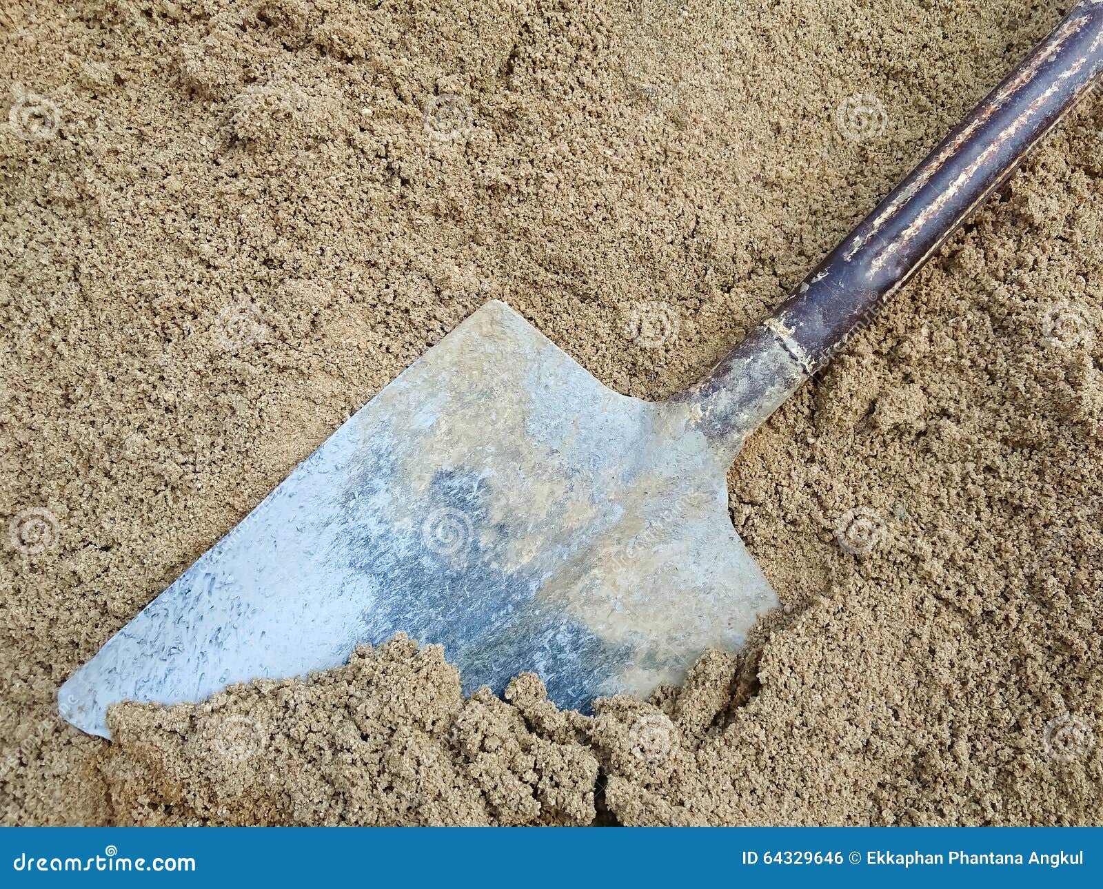 Dirty shovel on sand stock photo. Image of development 64329646
