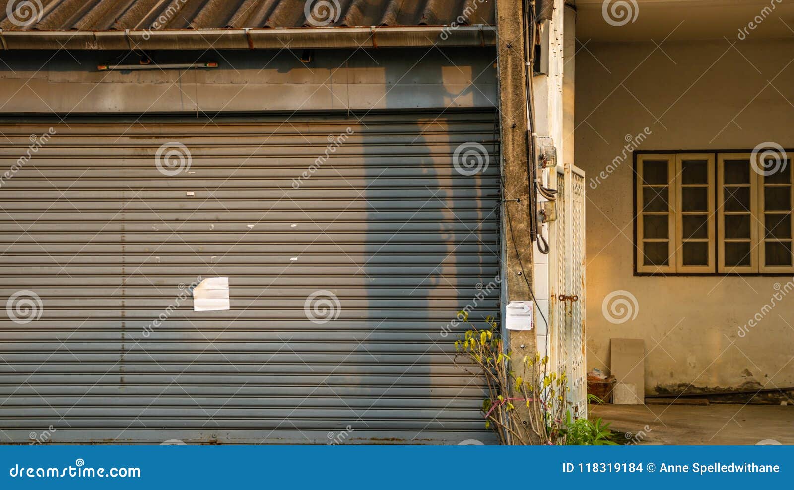 Dirty Vintage Roller Shutter Door With Blank Paper Note Old Ab