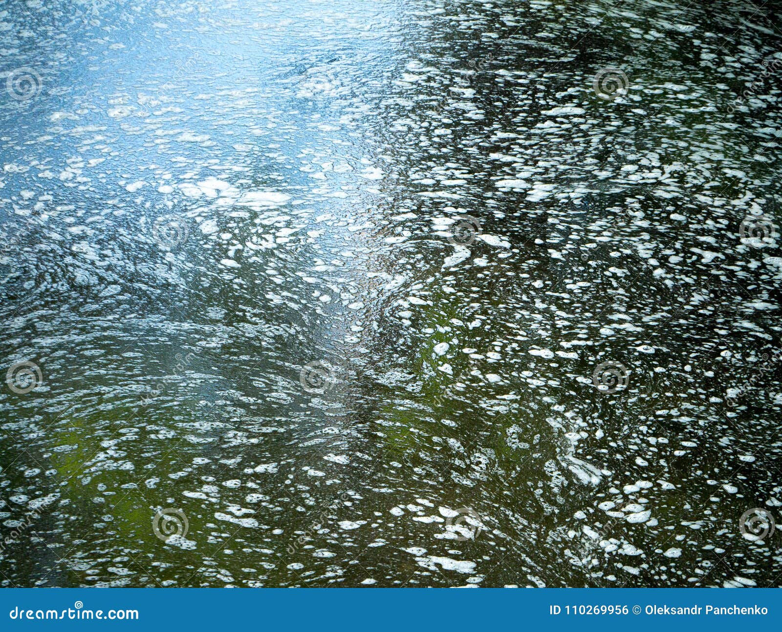 Dirty Water with Unrefined Waste Dumping into the River Stock Photo