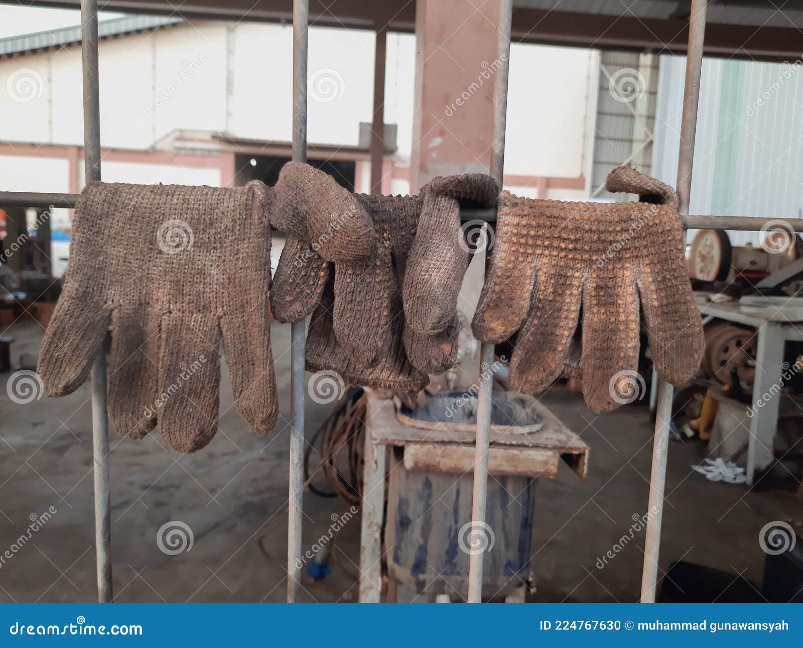 Dirty Work Gloves are Dried in the Sun after Use so they Can Be Reused