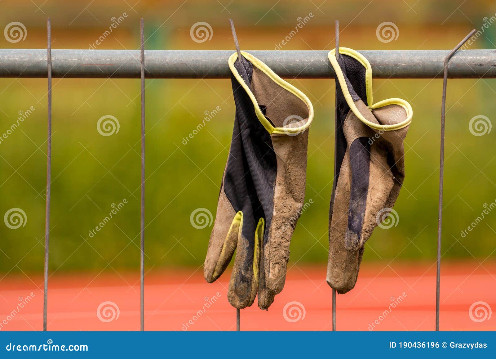 Dirty Work Gloves Hanging on Fence Stock Photo Image of wear, grid