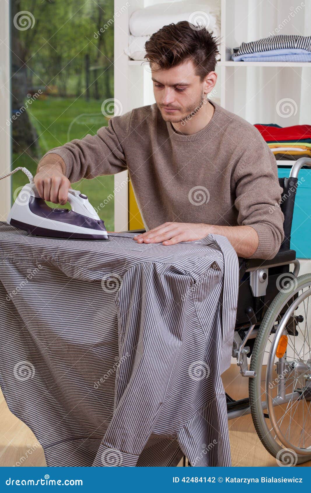 Disabled Ironing Shirts on Board Stock Photo Image of insurance, housework 42484142