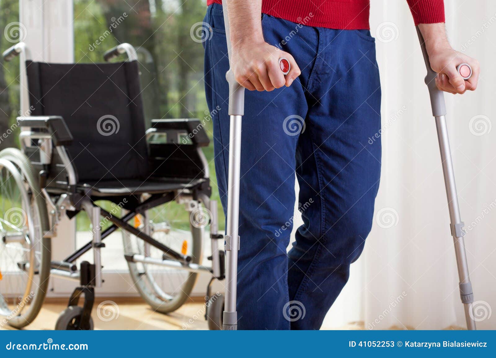disabled man on crutches