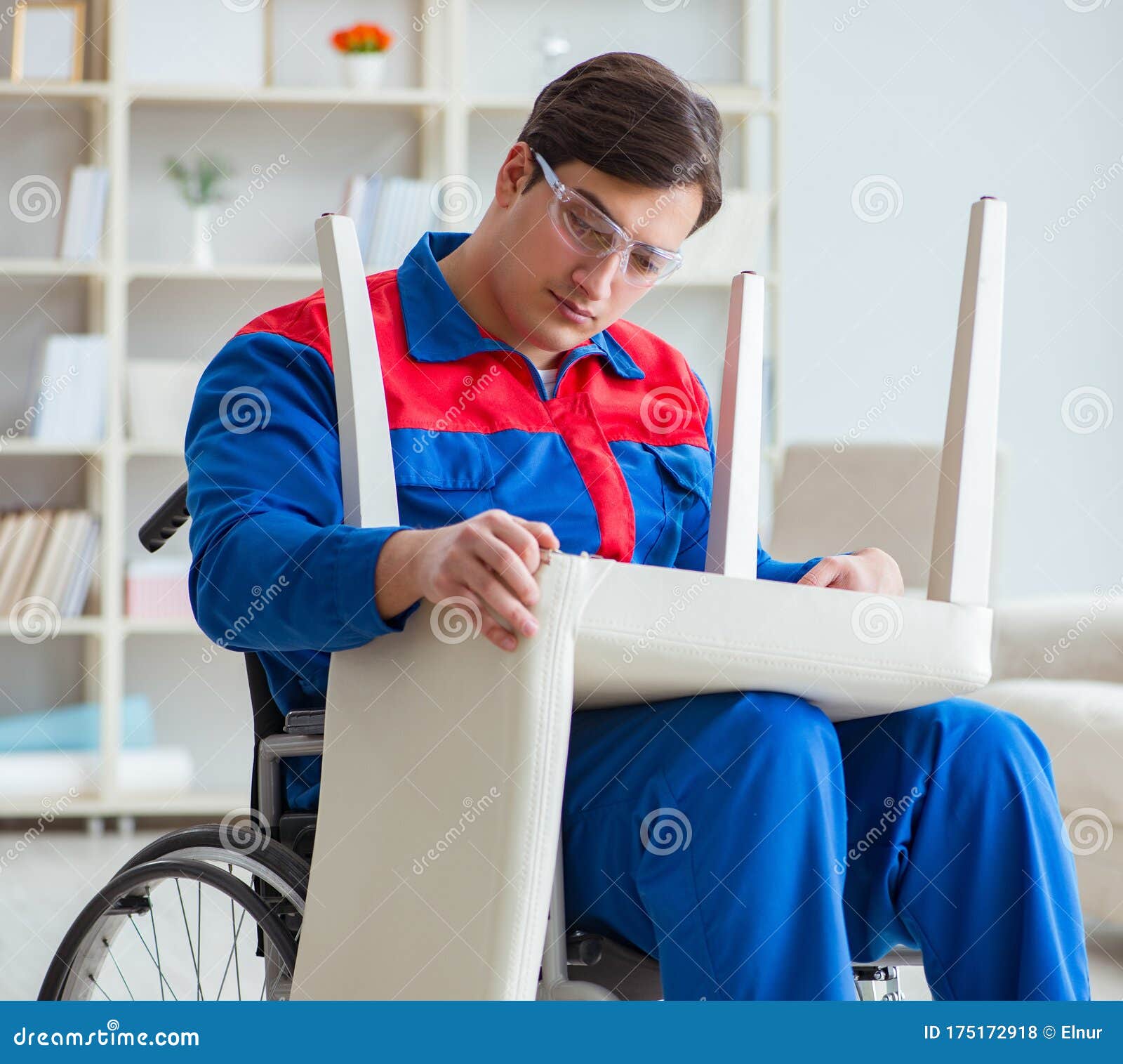 Disabled Man Repairing Chair in Stock Photo Image of