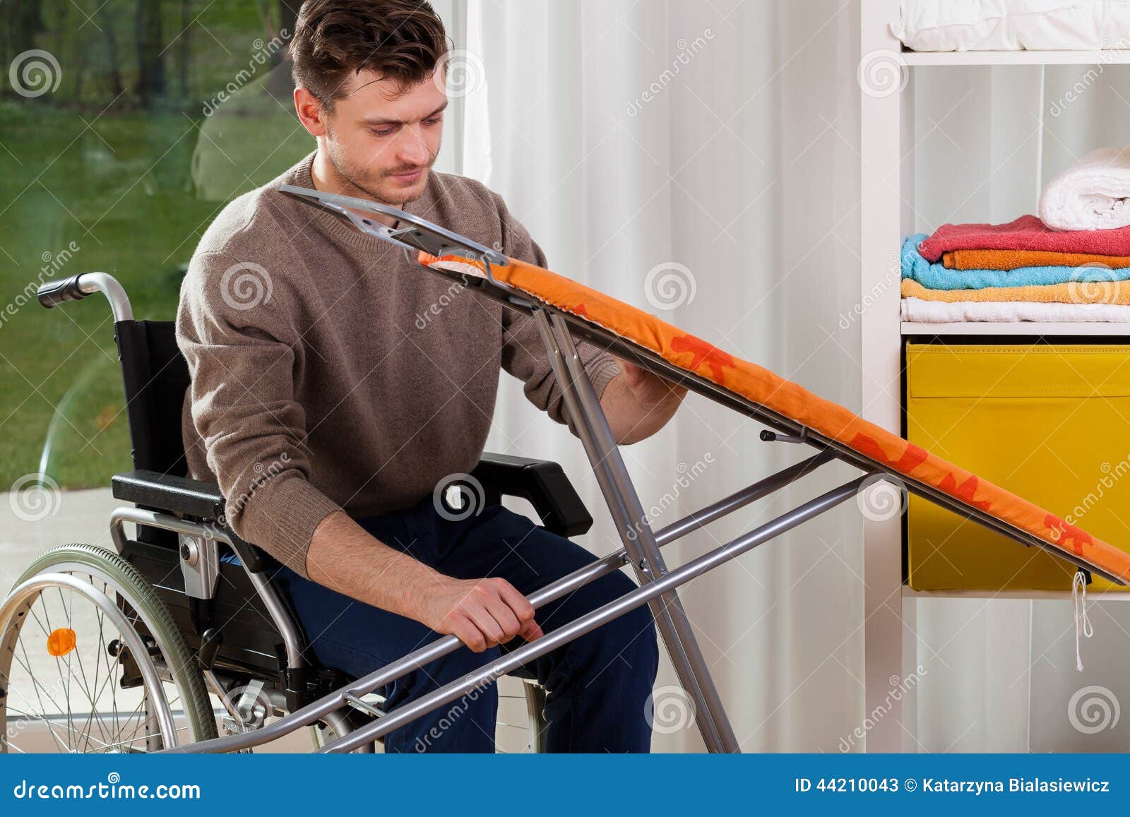 Disabled Man Setting Up an Iron Board Stock Image Image of healthcare, injured 44210043