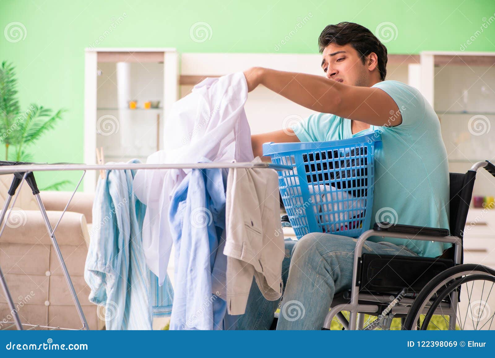 The Disabled Man on Wheelchair Doing Laundry Stock Image Image of