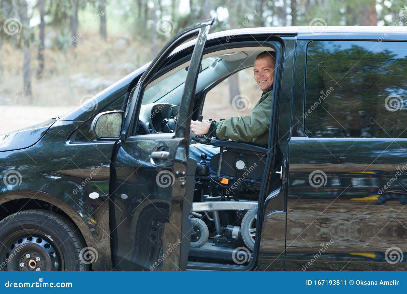 Disabled man driving a car stock image. Image of equipment 167193811