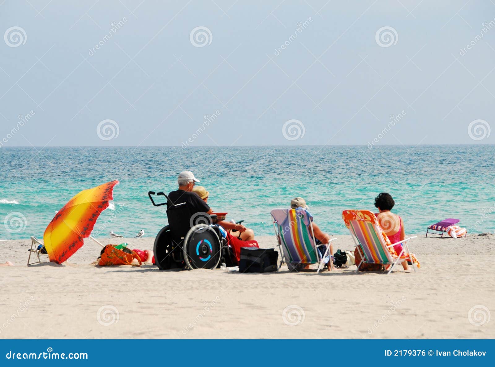 Disabled traveler on beach stock photo. Image of family 2179376