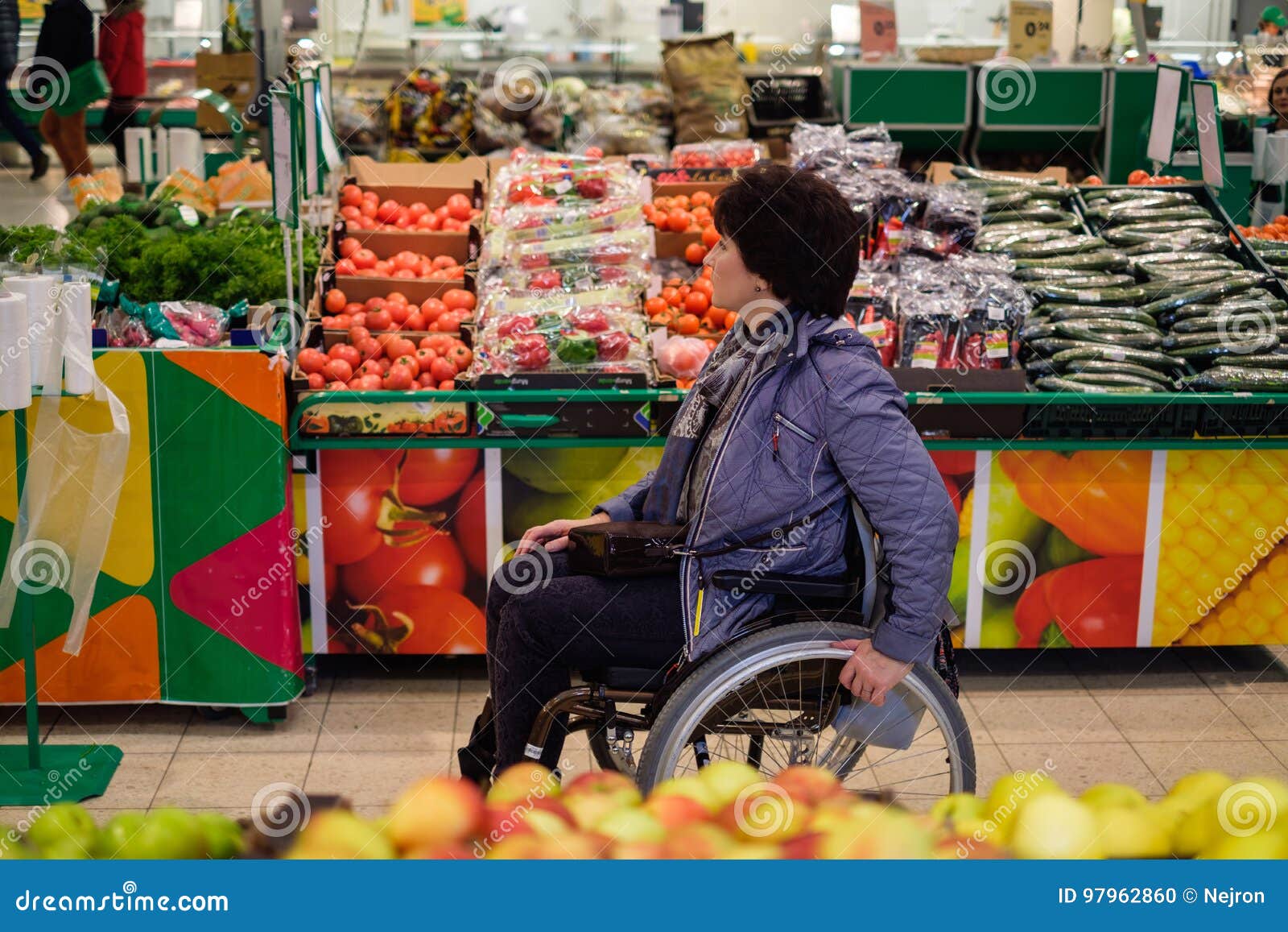 Disabled Woman in a Wheelchair in a Store Stock Photo Image of holding, basket 97962860