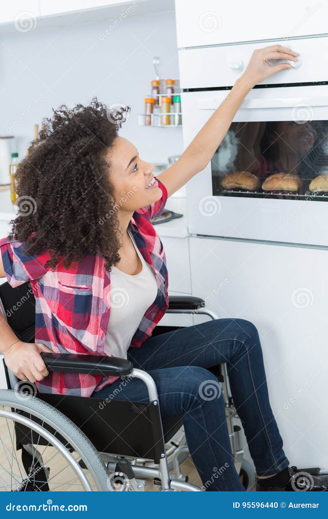 Disabled Young Woman in Wheelchair Opens Oven Stock Photo Image of