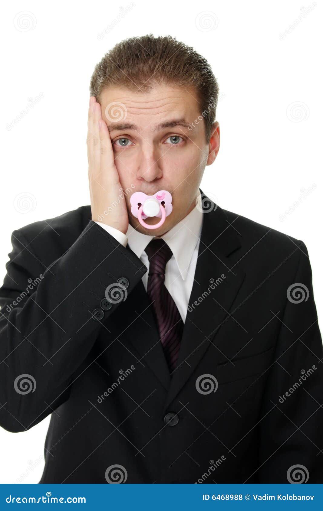 Disappointed Young Businessman with Pacifier Stock Photo Image of
