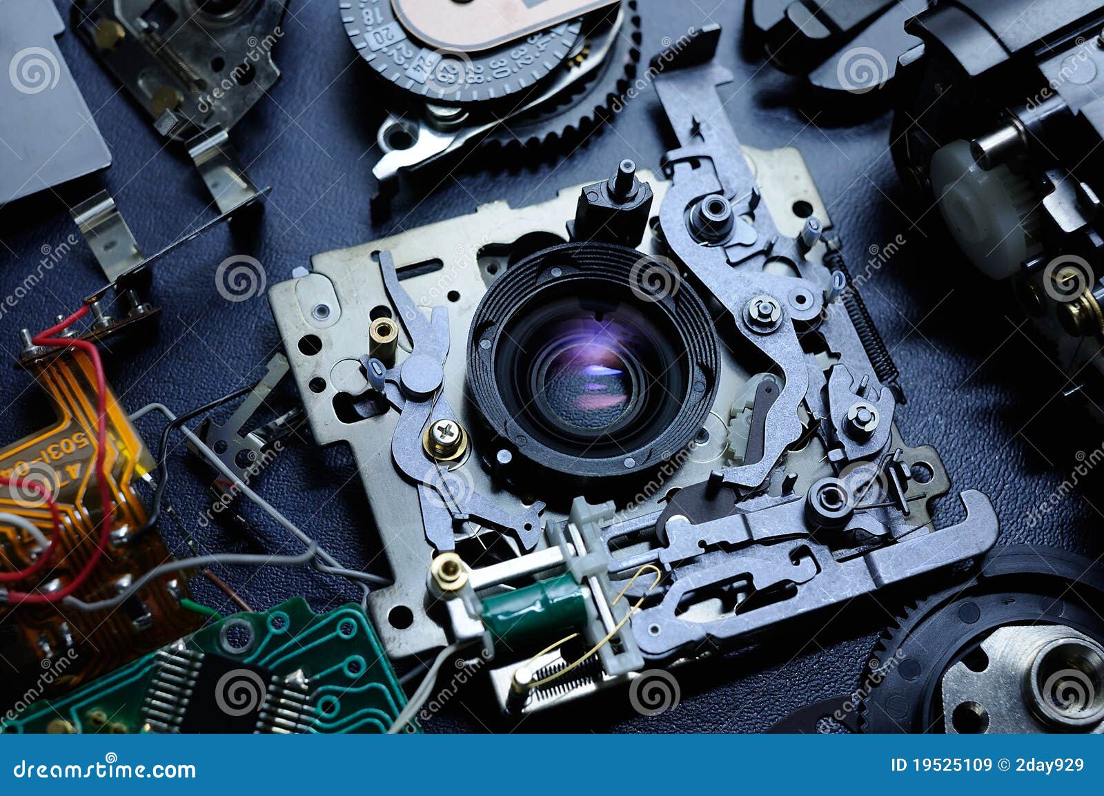 disassembled compact camera, flatlay