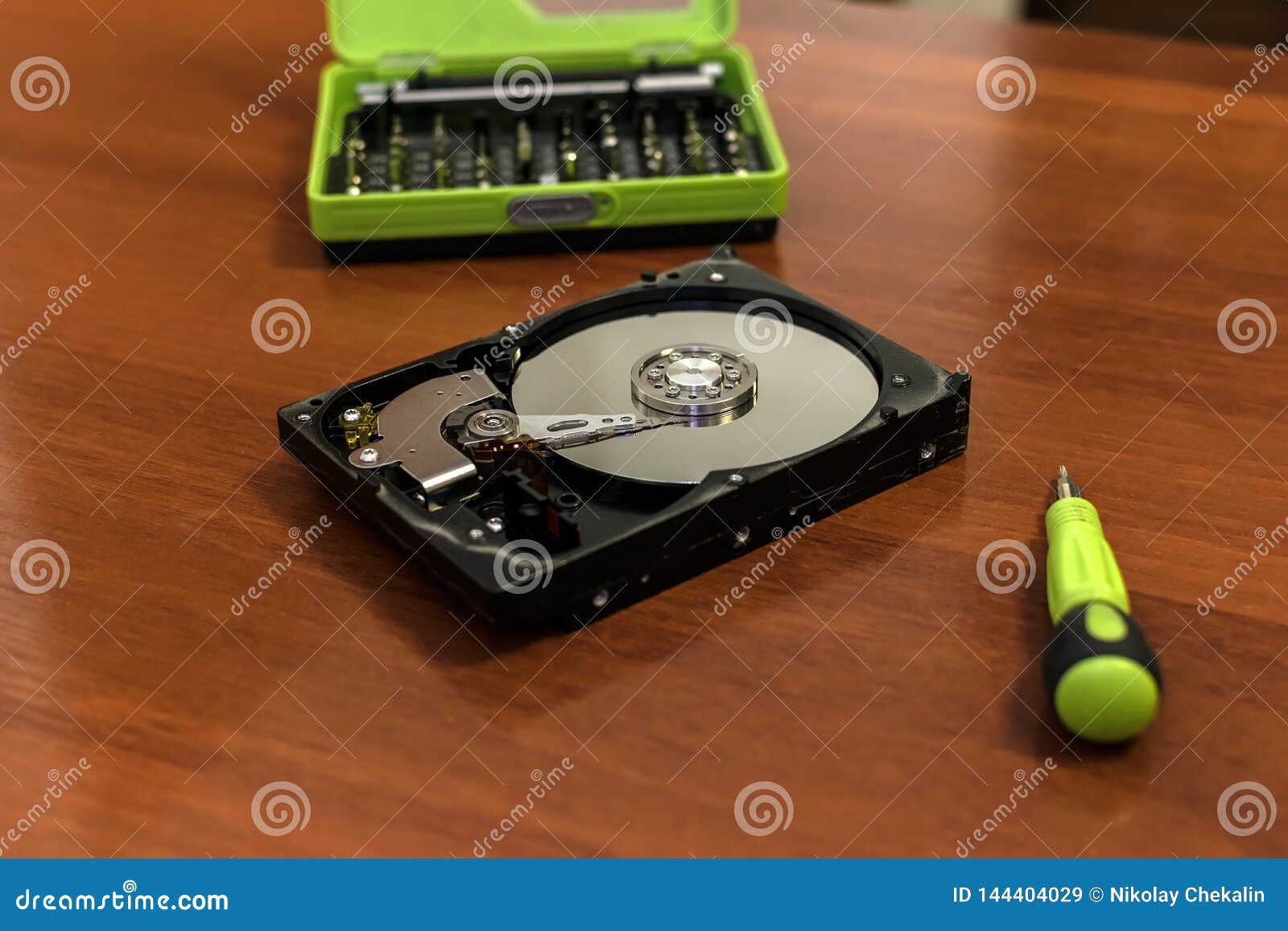 PC Hard Disk Disassembled with Screwdriver Stock Image Image of green