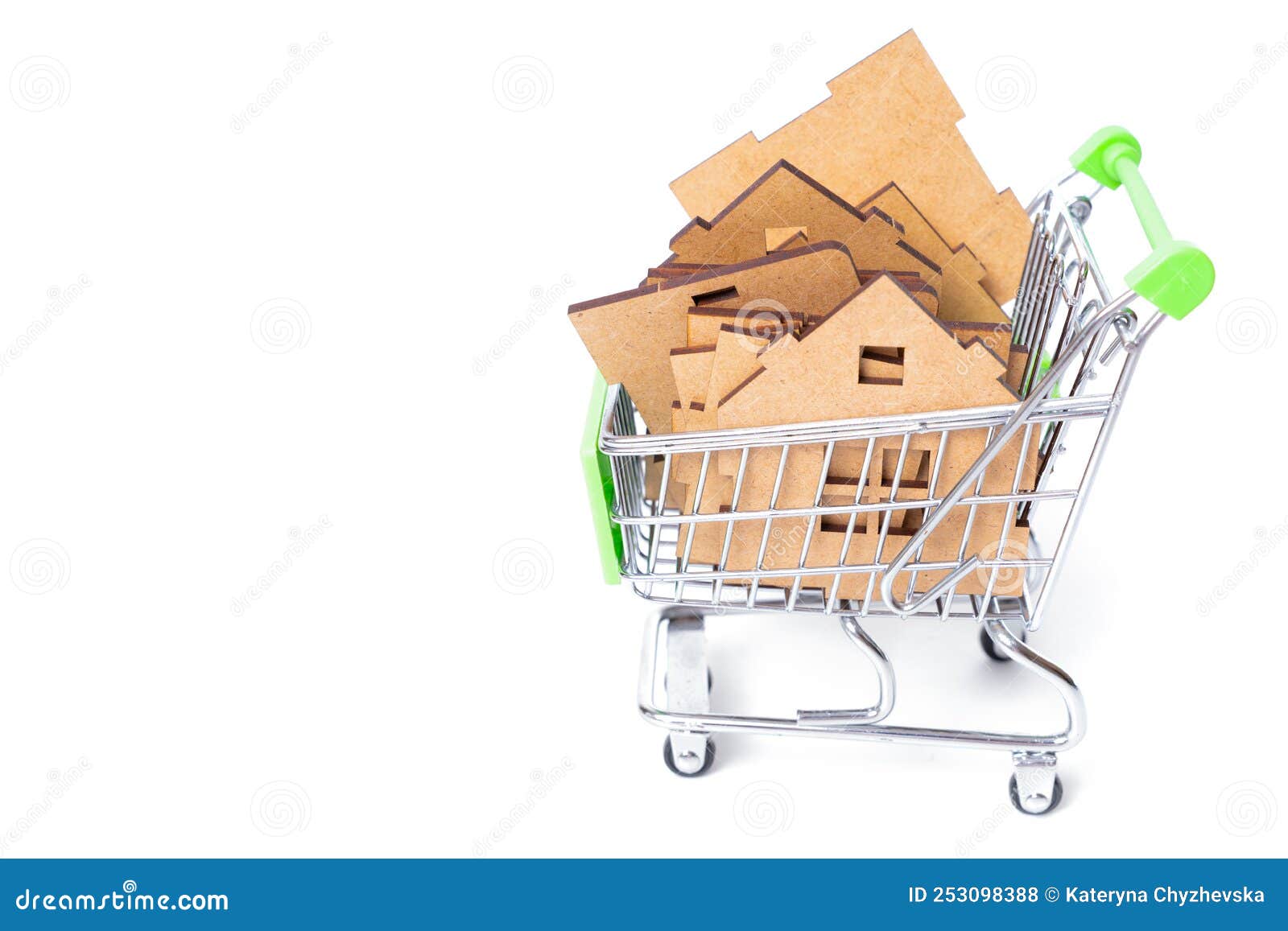 Disassembled toy house in a small push cart stock photo image of
