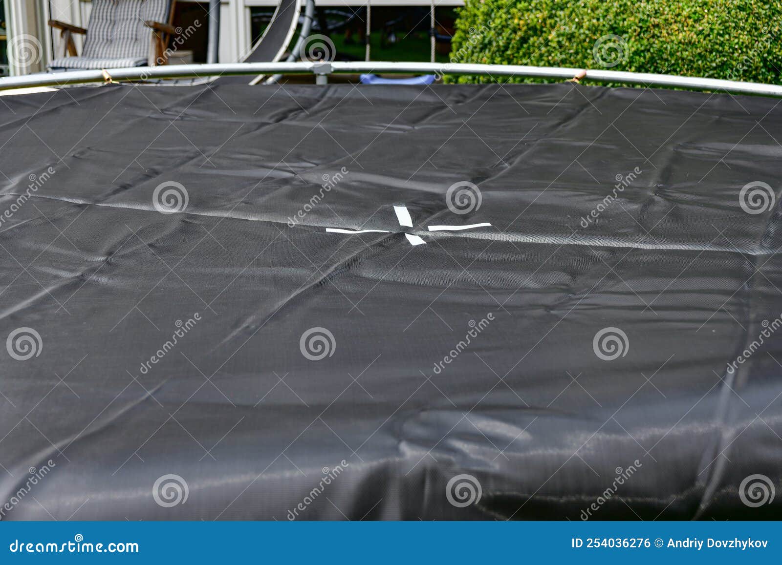 Disassembled Trampoline in the Yard after Purchase. Assembly and