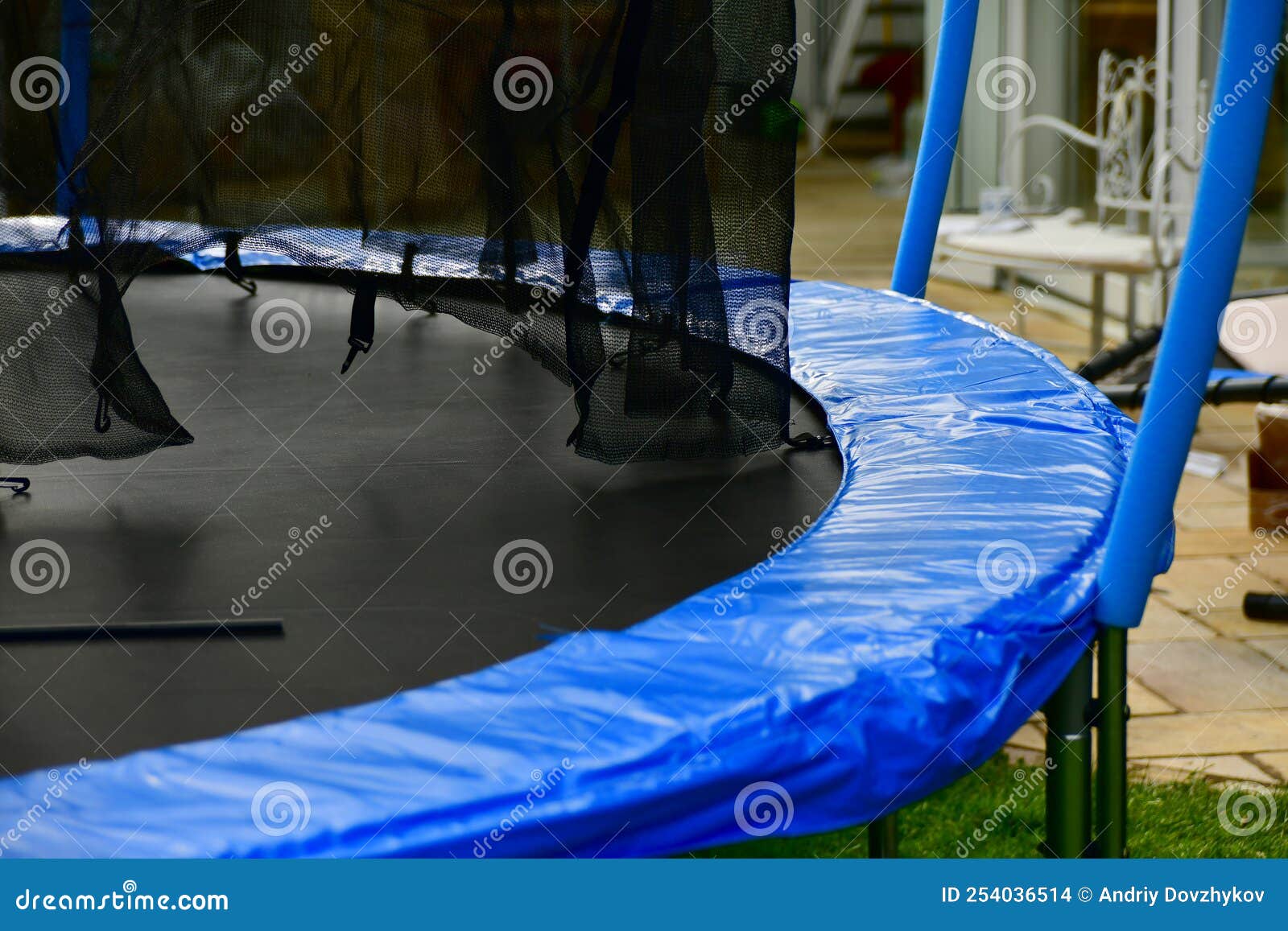 Disassembled Trampoline in the Yard after Purchase. Assembly and