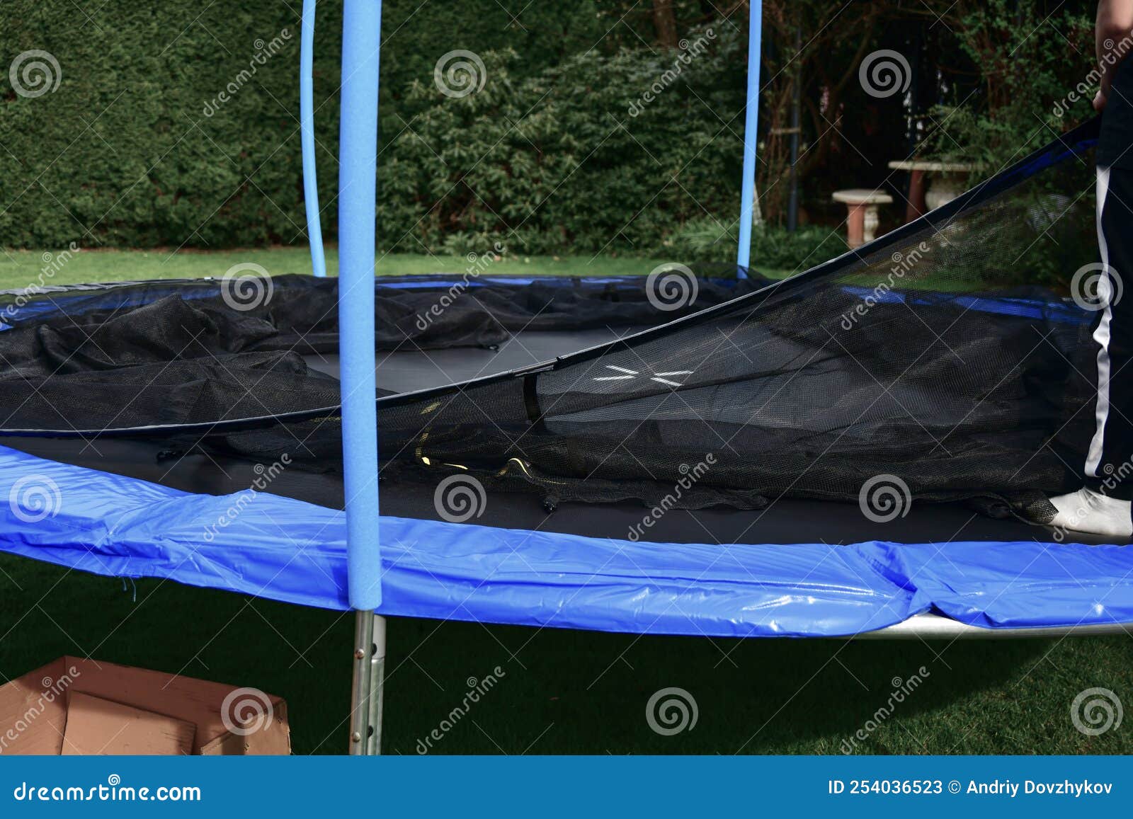 Disassembled Trampoline in the Yard after Purchase. Assembly and