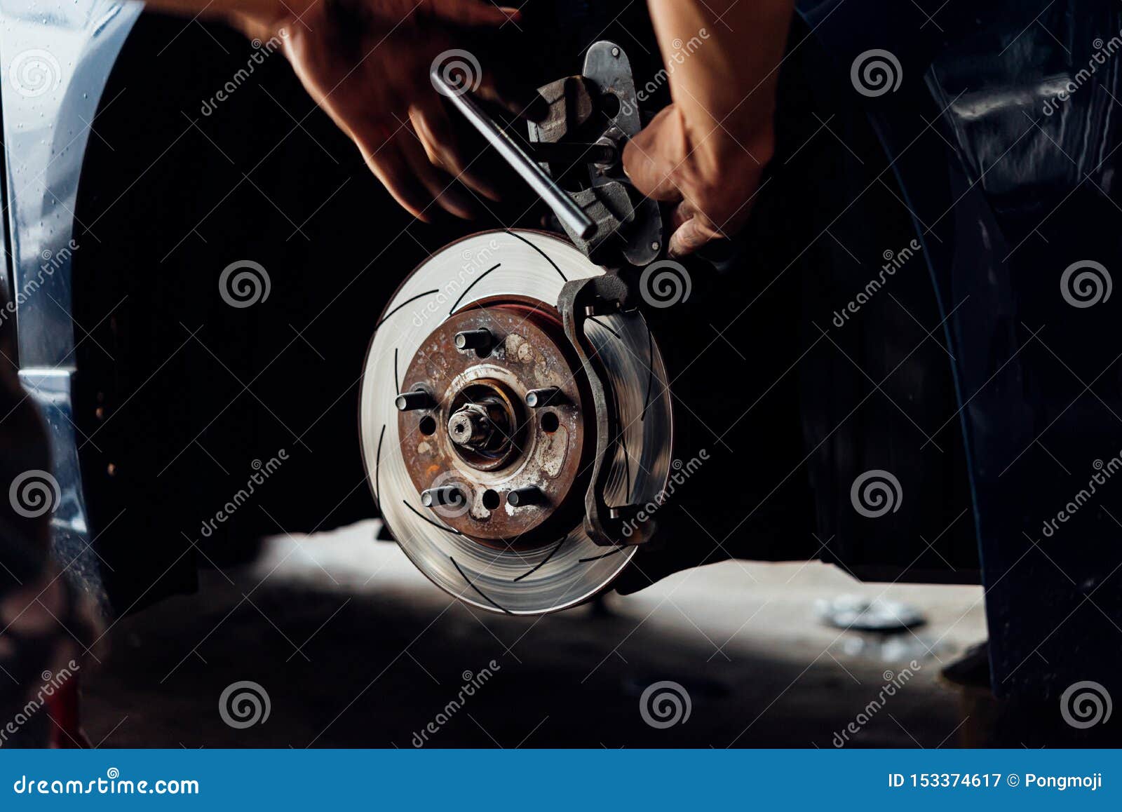 Disc Brake and Asbestos Brake Pads at Car Garage Stock Image - Image of