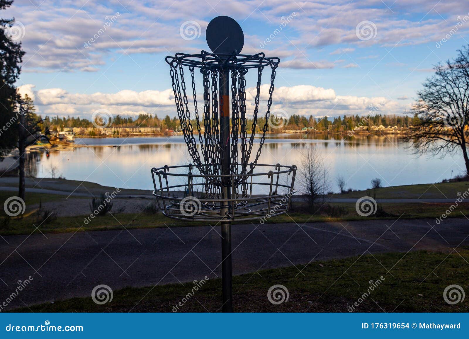 Disc Golf Basket On Pretty Park Course Near A Lake Under ...