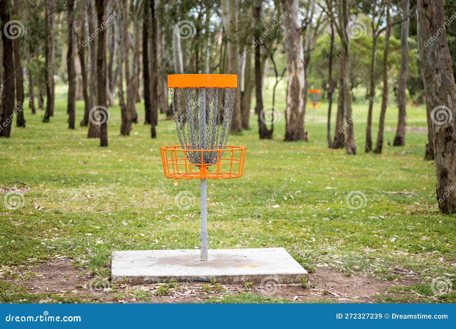 Disc golf basket in a park stock image. Image of colorful 272327239