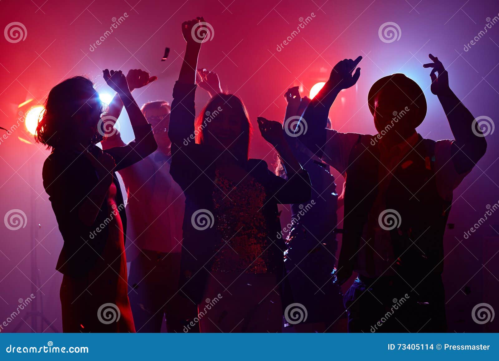 Disco dancing in red light stock photo. Image of motion - 73405114