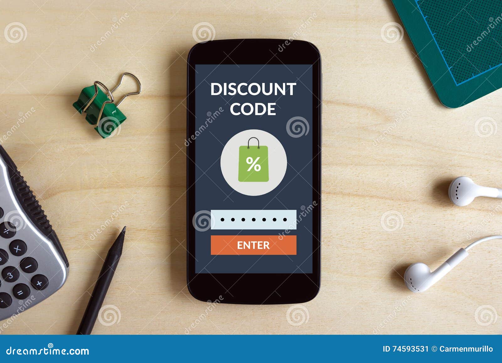 Discount Code Concept on Smart Phone Screen on Wooden Desk Stock Image