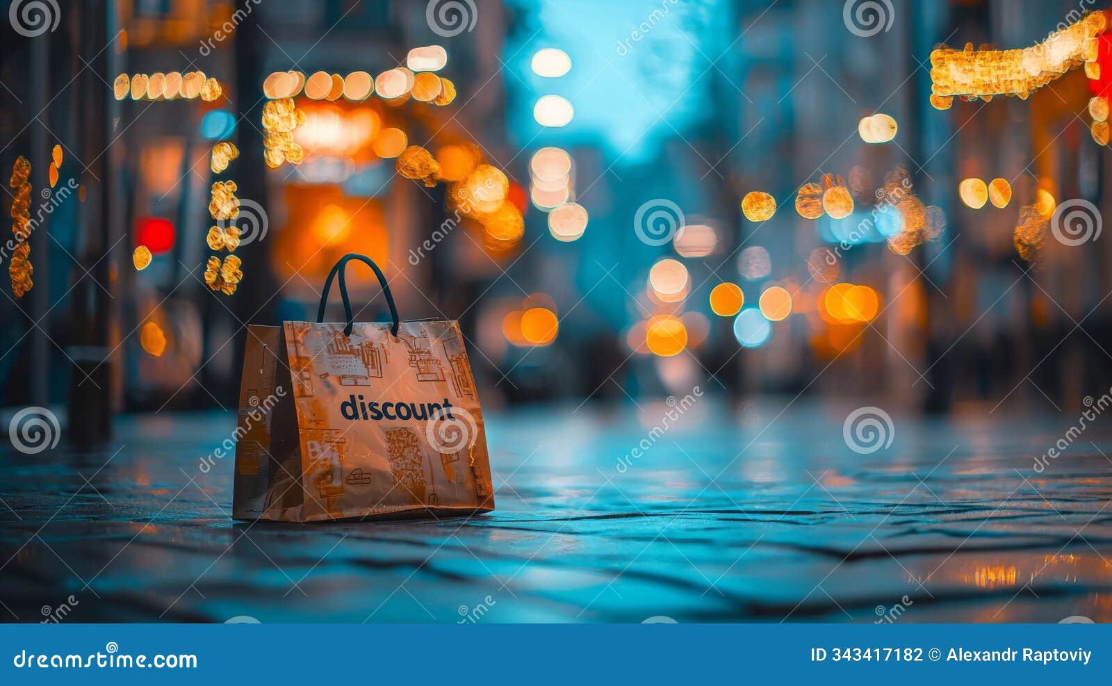 a discount shopping bag rests on a cobblestone street illuminated by festive lights at twilight
