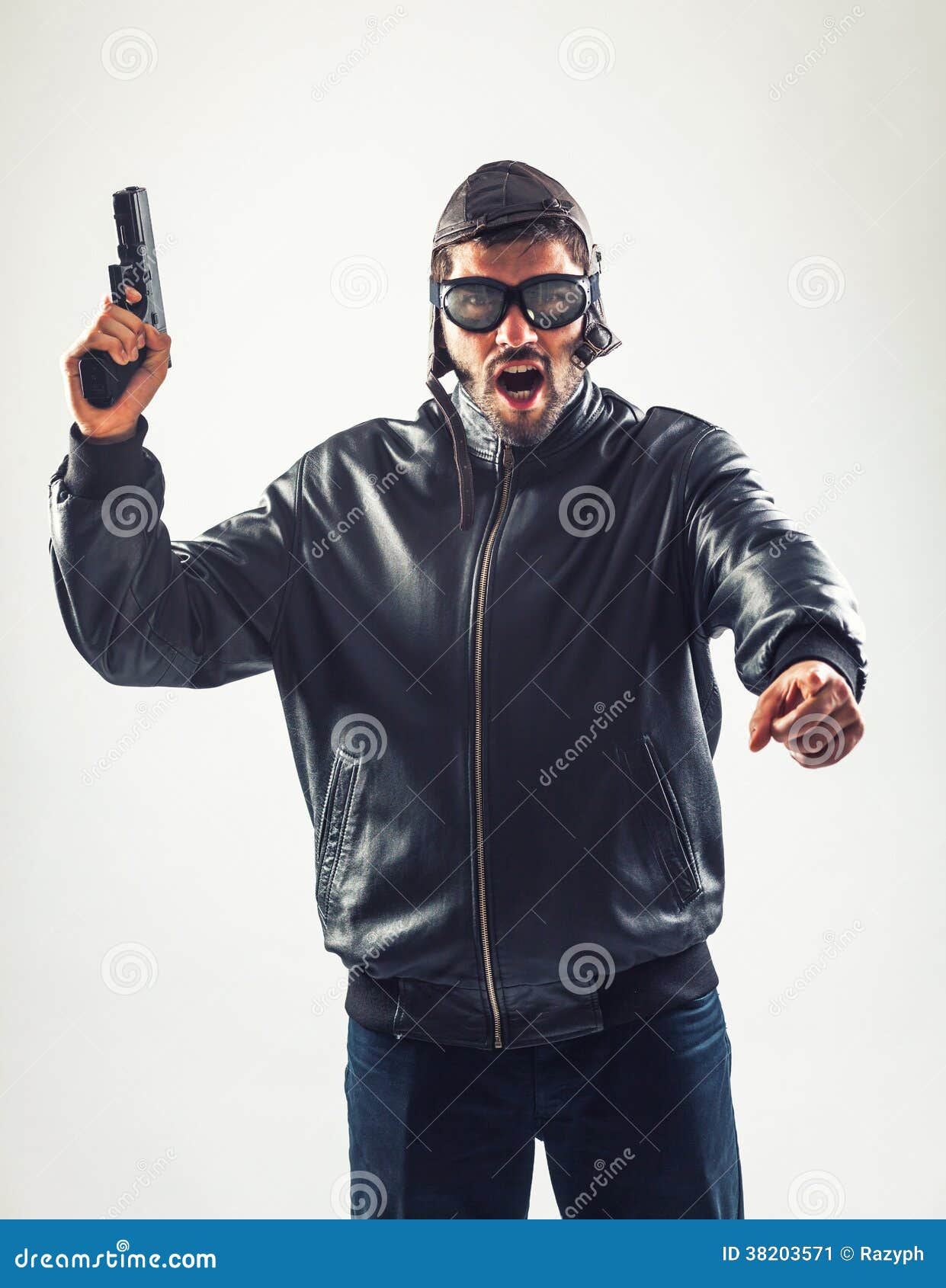 disguised angry man holding a gun threatening