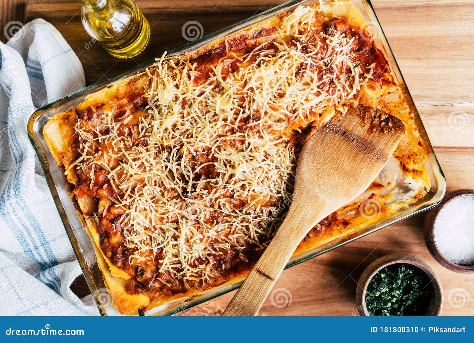 Dish of Bolognese Lasagna Gratin with Wooden Spoon To Serve Stock Photo ...