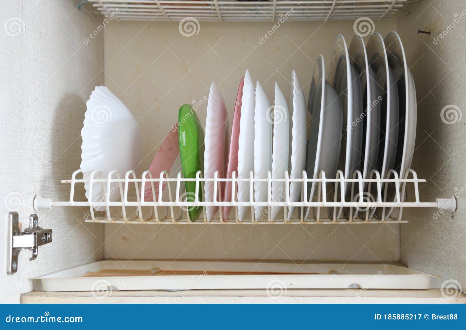 Dish Drying On A Metal Dish Rack In A Kitchen Cabinet Stock Image Image Of Drying