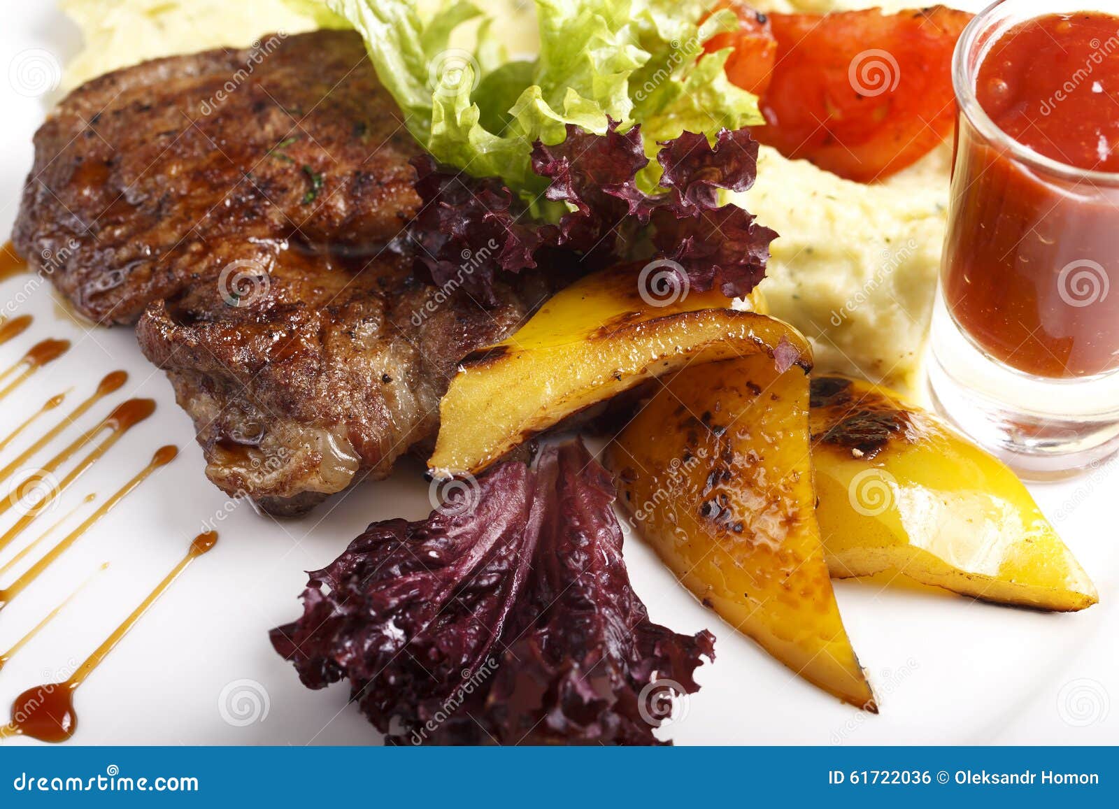 Dish with Meat, Potatoes and Herbs on a White Plate Stock Photo Image