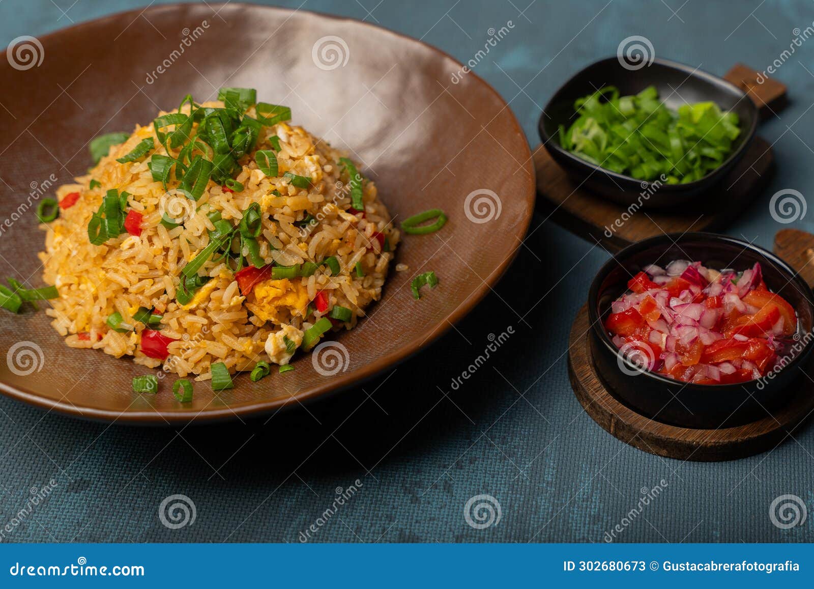 a dish of peruvian gastronomy, the result of the asian fusion, named arroz chaufa.