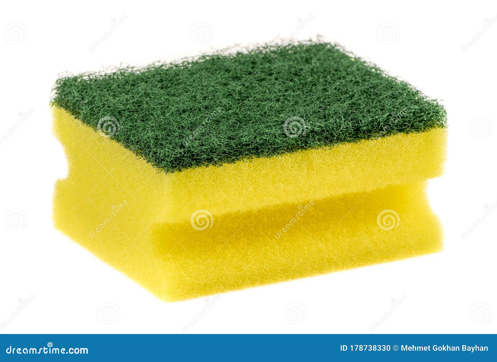 Yellow kitchen sponge for washing dishes isolated on white