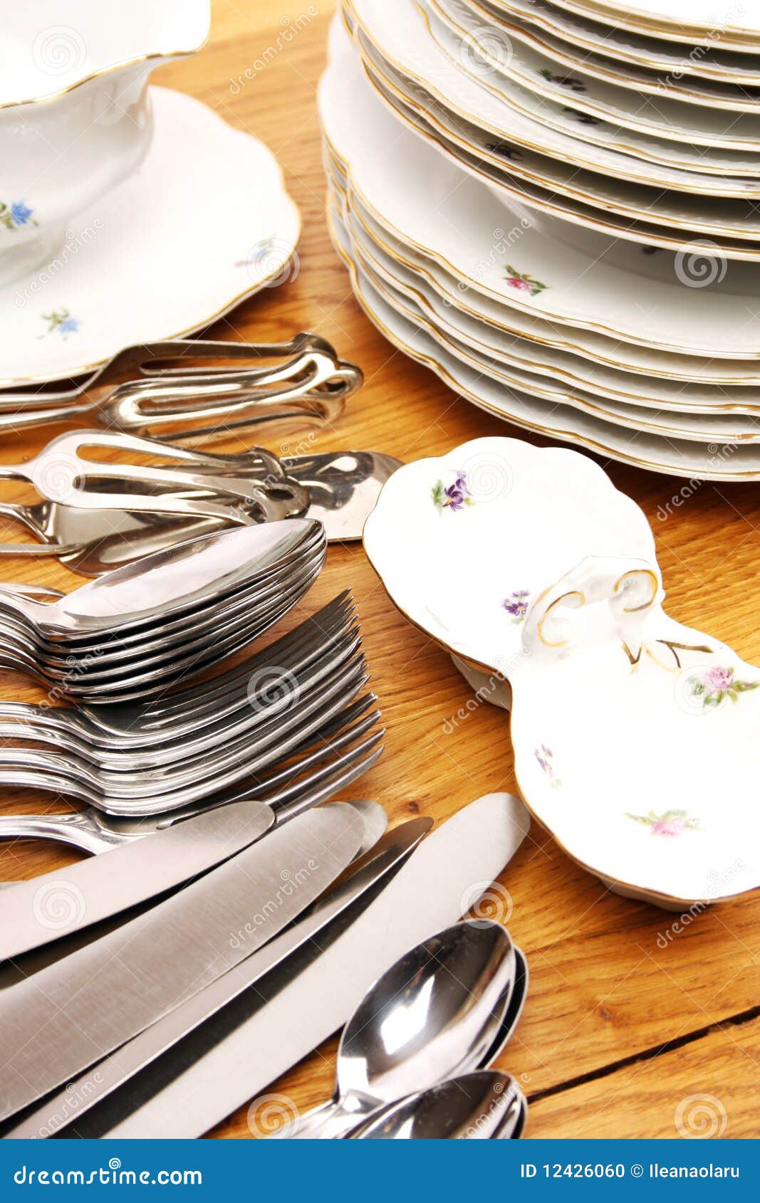 Dishes and cutlery set stock photo. Image of dine, classic 12426060